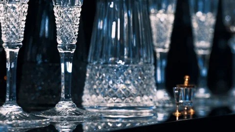 Set with different empty glasses on black background Video stock 99996466