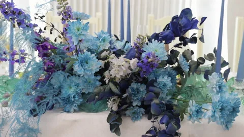 A set of different flowers on the table, a festive table decorated with flowers Stock Footage 218480981