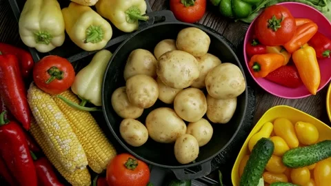 Set of different fresh raw vegetables in the wooden tray, wood background, top Stock Footage 157686923