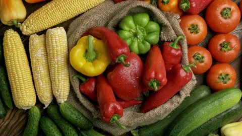 Set of different fresh raw vegetables in the wooden tray, wood background, top Stock Footage 157687378