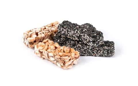 A set of different gozinaki dessert bars isolated on white background Stock Photos