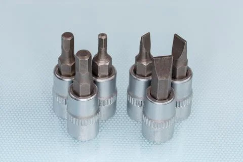 Set of different interchangeable flat and hexagonal bits for screwdriver Foto stock