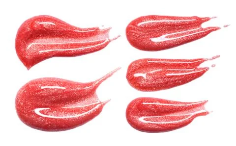 Set of different lip glosses smear isolated on white. Smudged makeup product  Stock Photos