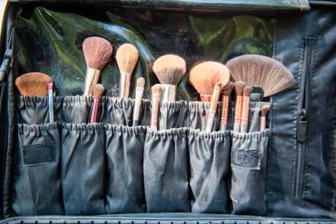 Set of different makeup brushes, makeup tools in bag Stock Photos