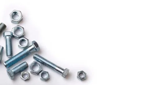 Set of different nuts and bolts isolated on white background with copy spac.. Stock Photos