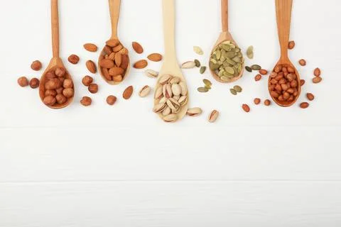 A set of different nuts on the table. Stock Photos