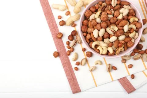 A set of different nuts on the table. Stock Photos