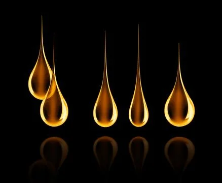 Set of different oily drops close-up on black background Stock Photos