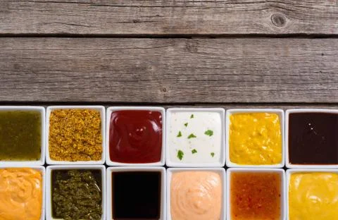 Set of different sauces in ceramic bowl Stock Photos