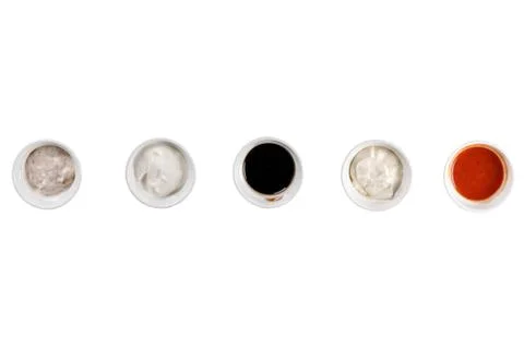 Set of different sauces on white background, top view. Stock Photos