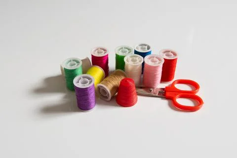 Set of different sewing threads on white background Stock Photos