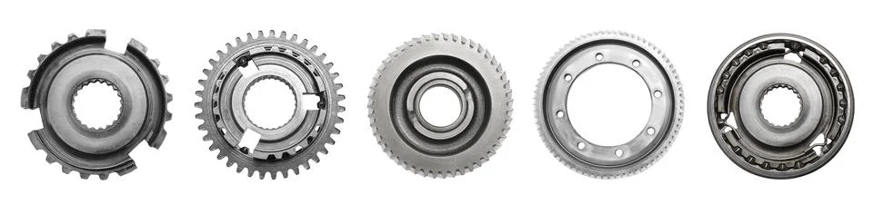 Set with different stainless steel gears on white background, top view. Ban.. Stock Photos