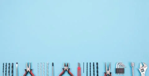 Set of different tools on blue background Stock Photos
