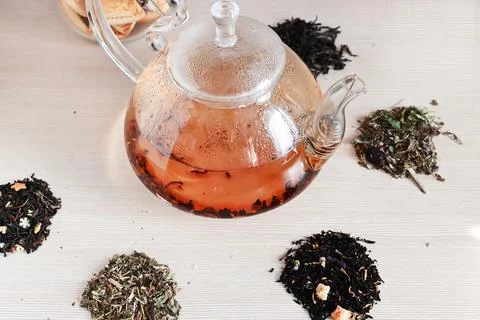 A set of different types of green, black and herbal tea, with hot brewed tea  Stock Photos