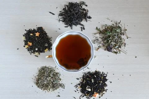 A set of different types of green, black and herbal tea, with hot brewed tea  Stockfoto's