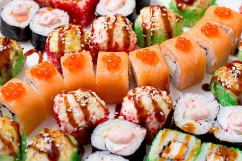 Set of different types of sushi on a white plate Foto stock