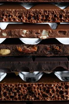 Set of different varieties of chocolate with nuts, raisins and fruit. Prepare Stock Photos