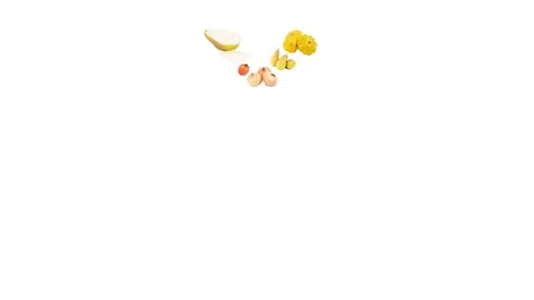 Set of different yellow and orange fruits and vegetables in the shape of the hea Stock Footage 125187498