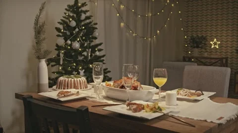 Set Dining Table and Decorated Christmas Tree for Festive Dinner 4K Stock-Footage 332159428