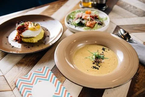 Set dinner of three courses. Chef's specialty resented in restaurant on serve Stock Photos