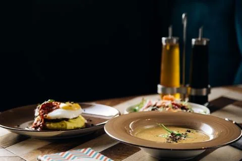 Set dinner of two courses. Chef's specialty presented in restaurant on served Stock Photos