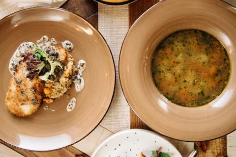 Set dinner of two courses. Chef's specialty presented in restaurant on served Stock Photos