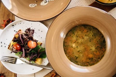 Set dinner of two courses. Chef's specialty presented in restaurant on served Stock Photos