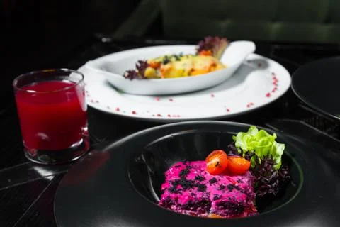 Set dinner of two courses. Chef's specialty presented in restaurant on served Stock Photos