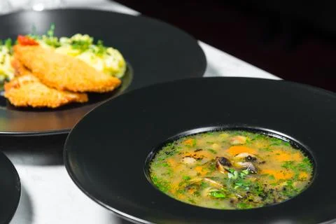 Set dinner of two courses. Chef's specialty presented in restaurant on served Stock Photos