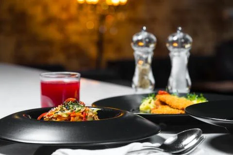 Set dinner of two courses. Chef's specialty presented in restaurant on served Stock Photos