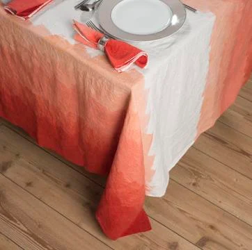 Set Dinnerware on Table with Gradient Orange Zigzag Design Tablecloth Stock-Fotos