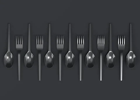 Set of disposable utensils like spoon, fork and knife on monochrome black Stock Photos