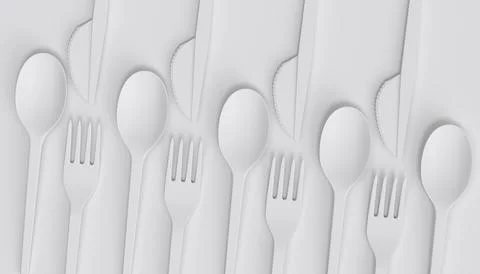 Set of disposable utensils like spoon, fork and knife on monochrome backgroun Stock Photos
