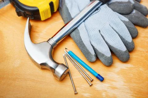 Set of diy tools on wooden table. Stock Photos