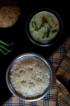 Set dosa along with vegetable stew on a dark background Stock Photos