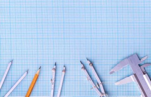 Set of drawing tools on the drawing paper. Stock Photos