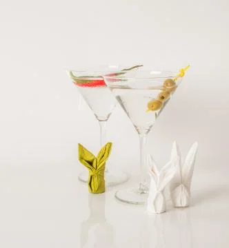 Set of drinks, drink decorated with olives nad pepper, bunny napkin, martini Stock Photos