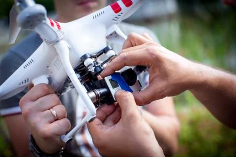 Set up drone camera with hand of professional Stock Photos
