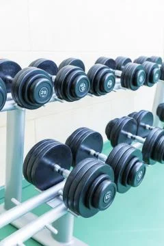 Set of dumb-bells Stock Photos