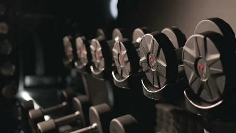 Set of dumbbells of different sizen Stock Footage 93372428