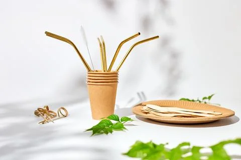 Set of eco friendly tableware, reusable, utensils stainless steel straws Stock Photos