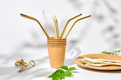 Set of eco friendly tableware, reusable, utensils stainless steel straws Stock Photos