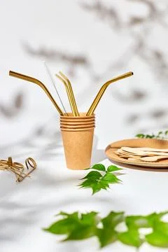 Set of eco friendly tableware, reusable, utensils stainless steel straws Stock Photos