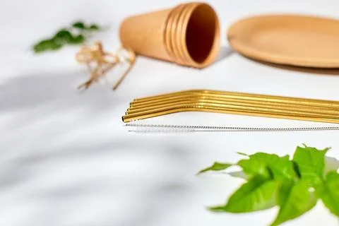 Set of eco friendly tableware, reusable, utensils stainless steel straws Stock Photos