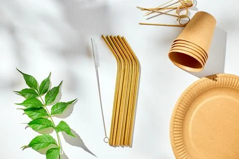 Set of eco friendly tableware, reusable, utensils stainless steel straws Stock Photos