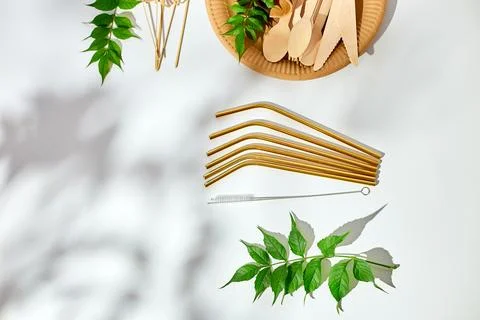 Set of eco friendly tableware, reusable, utensils stainless steel straws Stock Photos