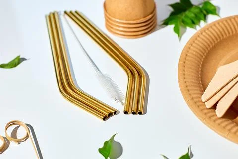 Set of eco friendly tableware, reusable, utensils stainless steel straws Stock Photos