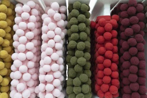 Set edging braid with pompons, fringe for creativity, needlework, fabric. Hobby Stock Photos