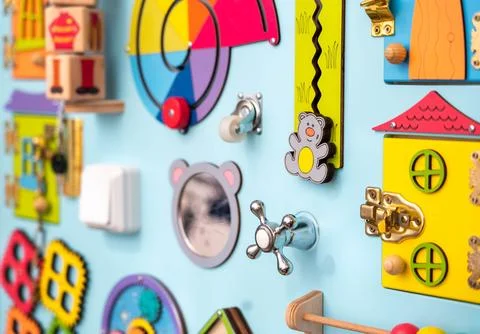 A set of elements of an entertaining board using the Montessori method Foto stock