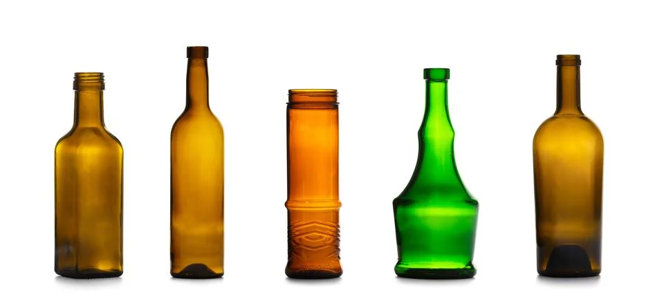 Set of empty bottles for alcoholic drinks of different colors and shapes, i.. Stock Photos